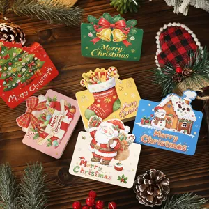 Vielfalt an festlichen Weihnachtskarten mit Weihnachtsmann- und Lebkuchenhaus-Motiven