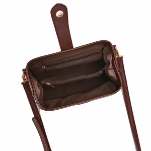 Interior detail of vintage brown doctor bag with secure zipper pockets and lining