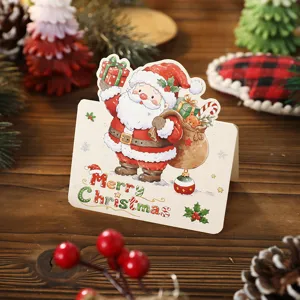 Süße Weihnachtskarte mit Weihnachtsmann Motiv und Merry Christmas Schriftzug für Geschenke