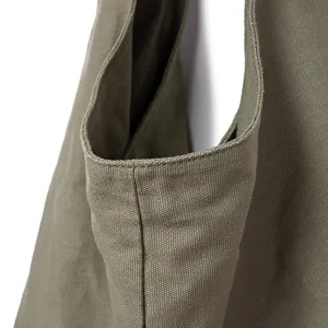 Primer plano de la tela de lona de algodón y lino y las costuras de un bolso vintage.