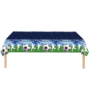 Detailed view of soccer theme party tablecloth with goal and stadium pattern design.