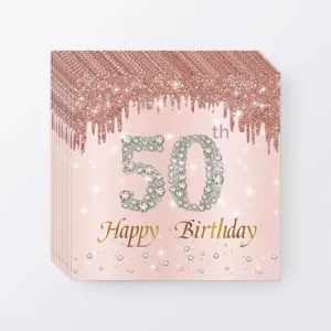 Détail de serviettes 50e anniversaire or rose avec gouttes de paillettes et diamants