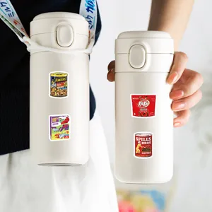 Detailed view of creative American snack packaging stickers applied to white thermal bottles