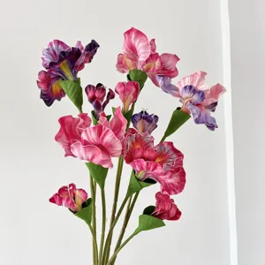 Detailed macro view of colorful oil painting style 2-head artificial Iris flowers
