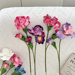Detailed view of vibrant oil painting style artificial iris flowers for home decor