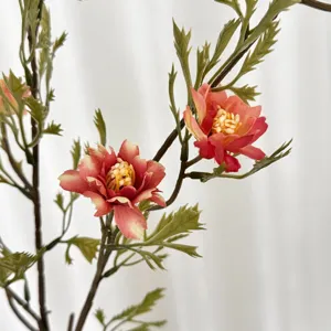 Close-up of retro autumn artificial wild chrysanthemum with realistic orange petals