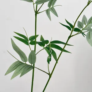 Close-up of green artificial bamboo leaves with realistic texture for Zen decor.