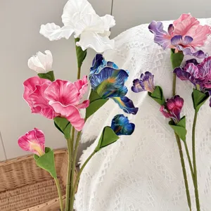 Detail shot of vibrant oil painting style artificial iris flowers for home decoration