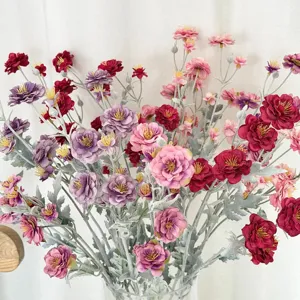 Close-up of beautiful colorful flocked artificial camellia flowers for decoration