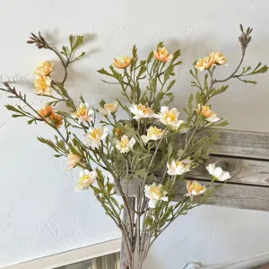 Close-up detail of autumn-colored artificial wild chrysanthemums with realistic textures