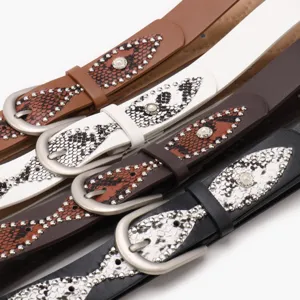 Y2K style faux leather belts with pearl studs and snakeskin patterns in four colors