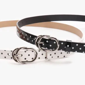 Deux ceintures fines pour femmes avec motifs à pois noirs et blancs et boucles ovales