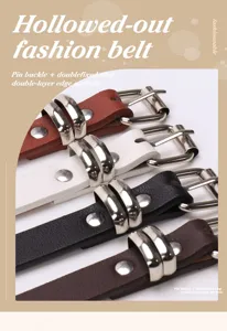 Detail close-up of multi-colored hollowed-out fashion belts with sleek metal pin buckles
