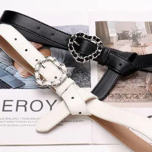 Elegant women's leather belt with stylish silver chain link buckle in black and white.