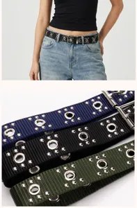 Detailed view of punk style rivet belts featuring metal grommets in black, navy and green