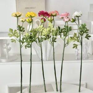 Detailed view of six colorful artificial Ranunculus flowers with realistic stems and buds.