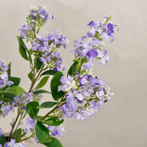 Macro detail of elegant purple and white artificial lilac flowers for home decoration