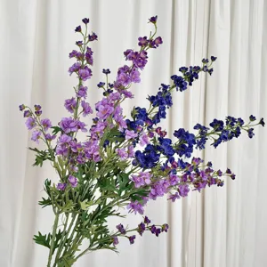 Elegant detail of 3-forked purple and blue artificial Delphinium flowers for decor