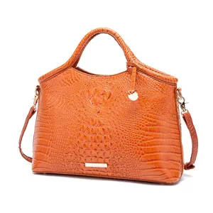 Vista detallada de bolso vintage naranja con elegante textura de cocodrilo en 3D