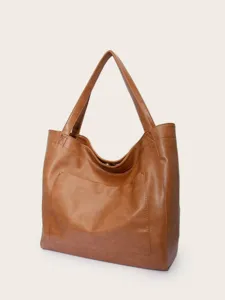 Bolso tote vintage de cuero sintético marrón de gran capacidad con bolsillo frontal.