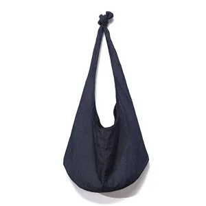 Bolso hobo vintage de lona de algodón azul marino con una elegante correa anudada