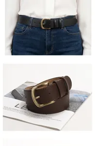 Vintage women's faux leather belt with antique gold metal buckle in black and brown