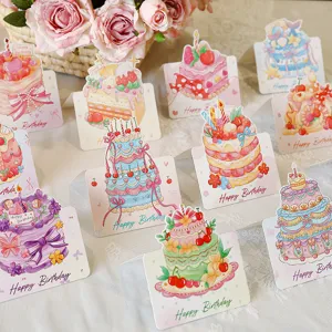 Selectie van aquarel 3D pop-up verjaardagskaarten met taart voor cadeauwinkels in boetiek.