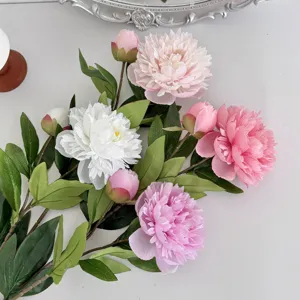 Detailed top view of realistic pink and white artificial peony flower bouquet