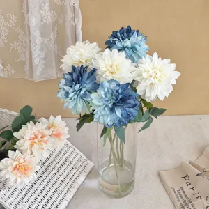 Detailed view of white and blue retro burnt edge artificial Dahlia bouquet in glass vase