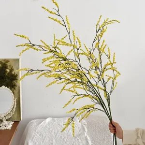 Realistische kunstmatige gele rijstgrasbloemen voor woonkamerdecoratie en rekwisieten