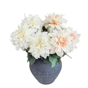 Elegant ivory white artificial dahlia flower bouquet in a grey ceramic vase for home table decor