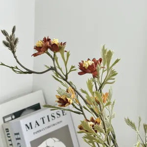 Macro detail of realistic artificial autumn wild chrysanthemums for vintage home decoration