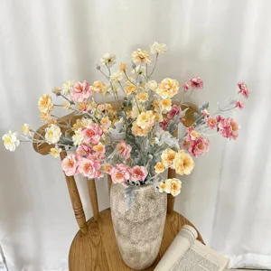 Elegant flocked artificial camellia bouquet in stone vase for living room home decor