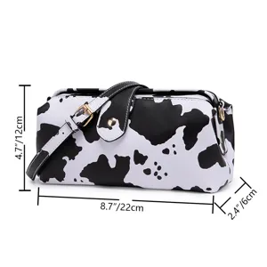 Detailed dimensions of the vintage cow print doctor bag: 22x12x6 cm.
