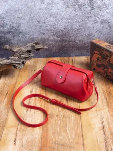 Vintage handmade red leather doctor crossbody bag with elegant gold-tone clasp closure