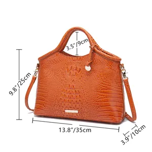 Medidas detalladas para este bolso de mano vintage naranja con grabado de cocodrilo