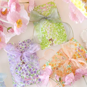 Elegant floral thank you cards with sheer organza ribbons and colorful flower patterns