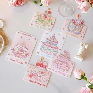 Detail of cute birthday cards featuring pastel cake and animal illustrations set.