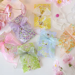 Elegant floral thank you greeting cards with sheer ribbons in various colors.