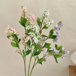 Detail macro view of colorful artificial lilac flowers for home and wedding decorations