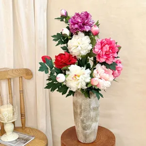 Elegant artificial peony bouquet centerpiece with realistic silk flowers in a vase