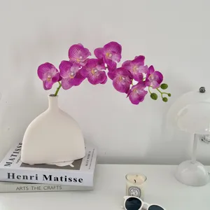 Close-up of vibrant purple 9-head artificial orchid branch with realistic petal textures.
