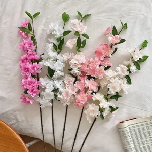 Artificial cherry blossom branches in pink and white for home decor and weddings