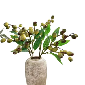 Realistic artificial wabi-sabi zombie fruit plant in a rustic beige ceramic vase