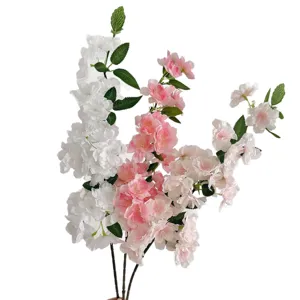 Artificial cherry blossom branches in pink and white for home and wedding decoration