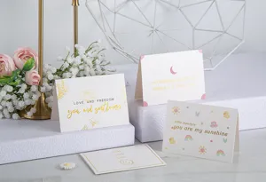 Surtido de tarjetas de felicitación doradas con citas inspiradoras para regalos