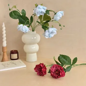 Elegant 2-head artificial silk peonies for wedding and home tabletop floral decoration.