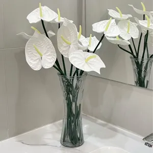 Elegant white EVA artificial anthurium flowers with glass vase for home interior