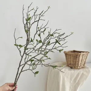 Realistic artificial dry branch with vibrant green buds for home decor and landscaping