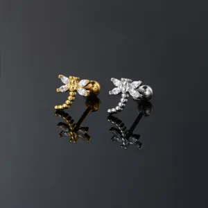 Macro detail of dragonfly stud earrings with sparkling marquise-cut CZ crystals